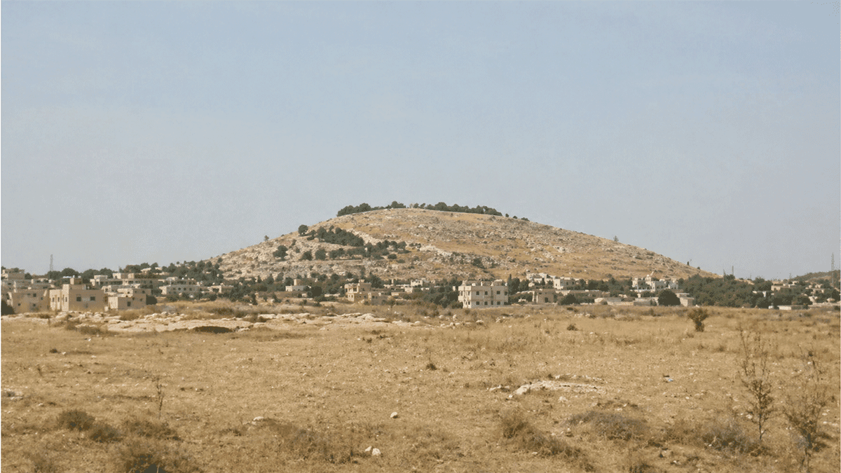 A distant view of Golgotha Hill shown as if opened from a map link.